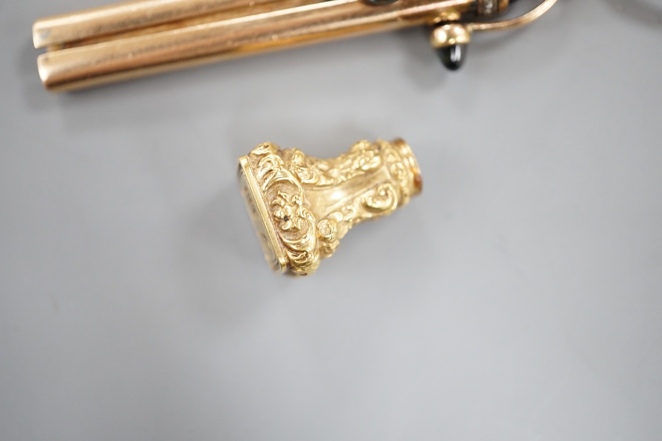 An early 20th century Russian 56 zolotnik yellow metal, four stone blue cabochon and rose cut diamond set propelling pencil holder, maker's mark, HW? overall 79mm, gross 18.7 grams, hung from a 9ct gold key ring, 3.8 gra